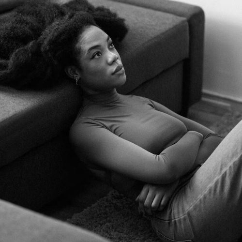 high-angle-woman-sitting-floor_23-2149735779_jpg_75